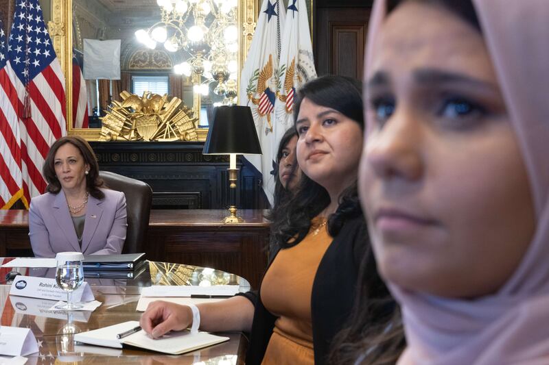 DACA recipient Hina Naveed meets Kamala Harris and other DACA recipients on July 22, 2021, in Washington. Getty Images / AFP