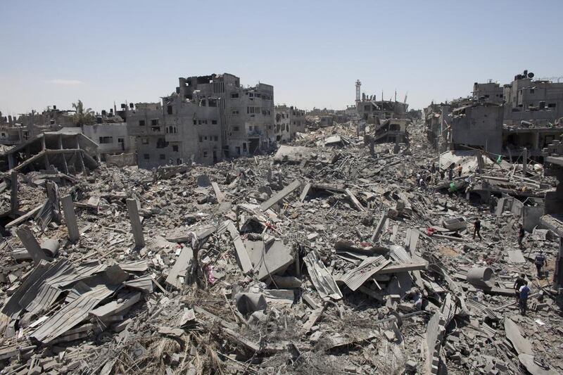 Residents of the Shujaieh area east of Gaza City, where thousands fled last Sunday and Monday, returned to find homes, businesses and mosques reduced to piles of debris.
