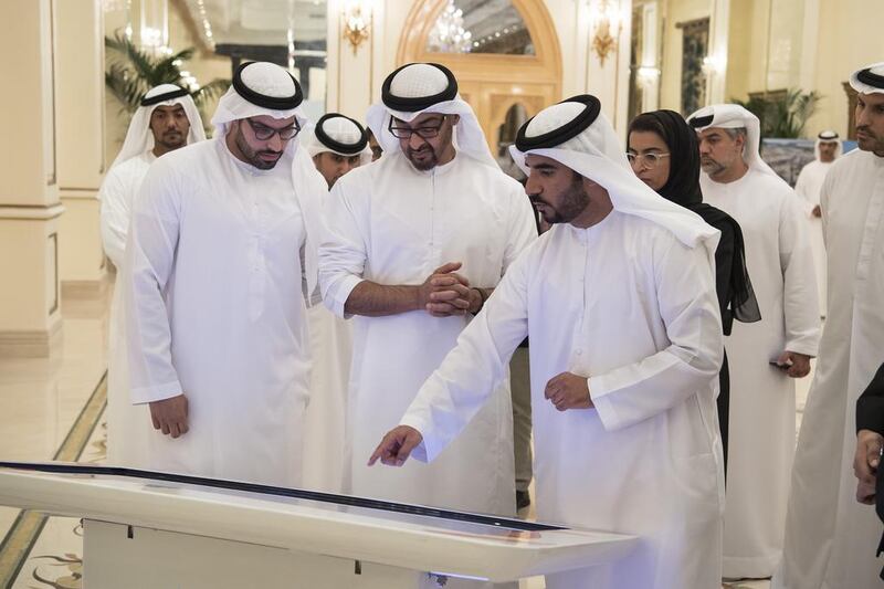 Sheikh Mohammed bin Zayed, Crown Prince of Abu Dhabi Deputy Supreme Commander of the Armed Forces, inspects a Dh 12 billion worth plan to develop the southern part of Yas Island, from Miral Asset Management Organisation, during a Sea Palace barza. Seen with Mohammed Al Mubarak, Chairman of Abu Dhabi Tourism and Culture Authority (L). Hamad Al Kaabi / Crown Prince Court - Abu Dhabi