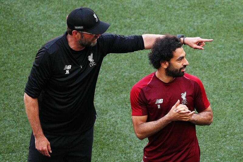 epaselect epa07615591 Liverpool's manager Juergen Klopp (L) and Mohamed Salah (R) attend their team's training session at the Wanda Metropolitano stadium in Madrid, Spain, 31 May 2019. Liverpool FC will face Tottenham Hotspur in the 2019 UEFA Champions League final at the Wanda Metropolitano stadium in Madrid, Spain, on 01 June 2019.  EPA/RODRIGO JIMENEZ