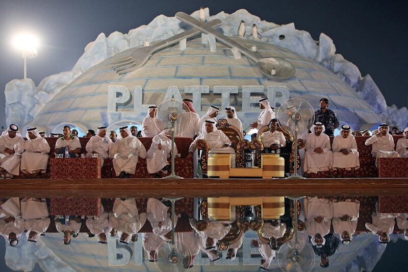 United Arab Emirates - Ras Al Khaimah - September 29, 2010.

NATIONAL: Crown prince and ruler, H. H. Sheikh Saud Bin Saqr Al Qasimi, center, watches the ceremonies at Ice Land Water Park during its grand public opening in Ras Al Khaimah on Wednesday, September 29, 2010. Amy Leang/The National