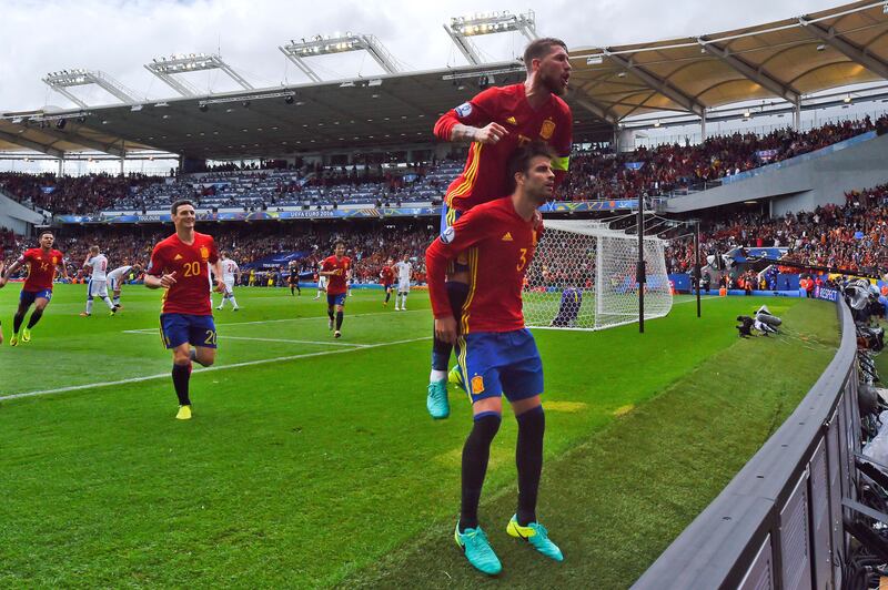 Gerard Pique, right, of Spain celebrates scoring his team's first goal with his teammate Sergio Ramos during the Euro 2016 Group D match against Czech Republic at Stadium Municipal on June 13, 2016 in Toulouse, France. Getty Images