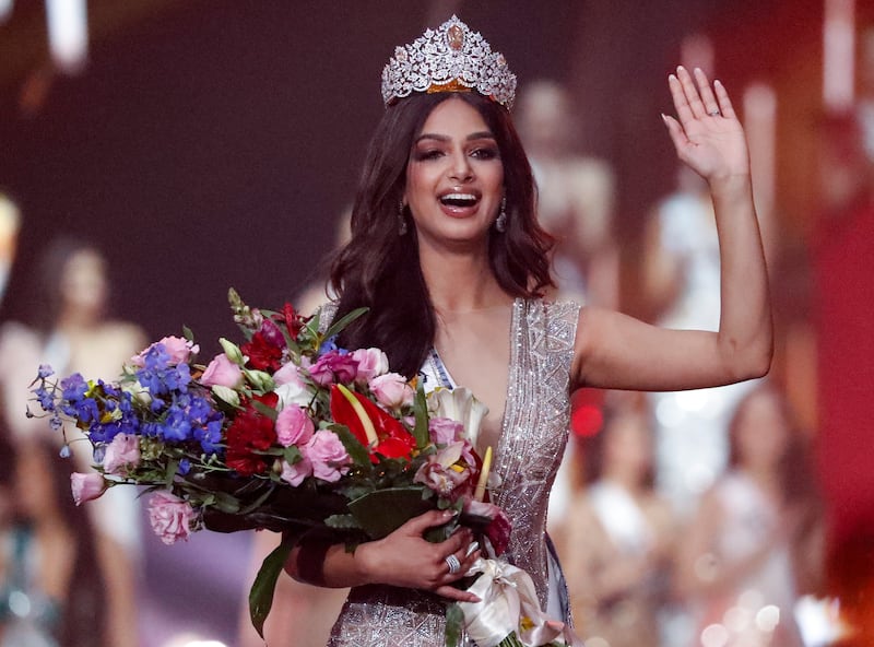 India's Harnaaz Sandhu waves after being crowned Miss Universe 2021 during the 70th Miss Universe pageant in Eilat, Israel. AP Photo