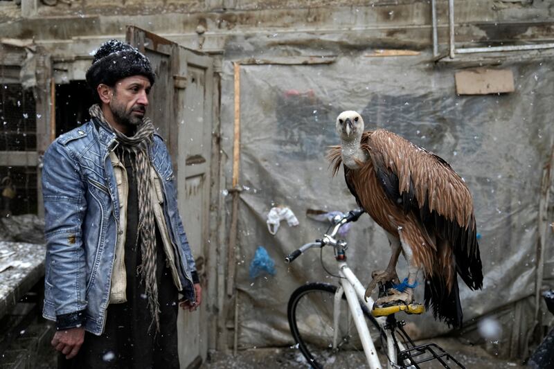 A bird seller at a market in Kabul. The country has scant resources to protect vulnerable citizens from the harsh winter. AP