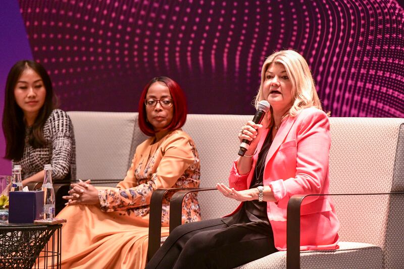 From left, Cathy Wu, Olayinka Odeniran and Sandy Carter during a panel discussion at the Access Granted event in Abu Dhabi. Khushnum Bhandari / The National