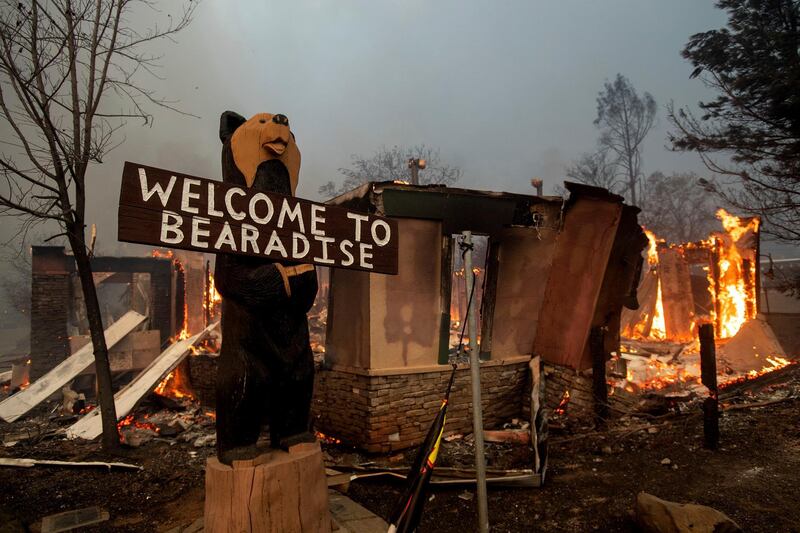 Flames consume a home as the Camp Fire tears through Paradise, California. AP Photo