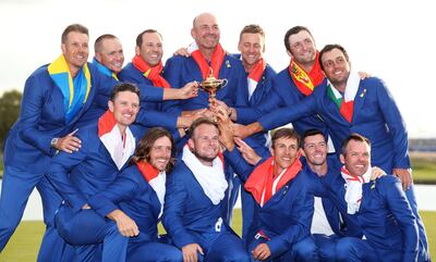 File photo dated 30-09-2018 of Team Europe's (top row, from the left to right) Henrik Stenson, Alex Noren, Sergio Garcia, captain Thomas Bjorn, Ian Poulter, Jon Rahm, Francesco Molinari (bottom row, from left to right) Justin Rose, Tommy Fleetwood, Tyrrell Hatton, Thorbjorn Olesen, Rory McIlroy and Paul Casey celebrate with the Ryder Cup on day three of the Ryder Cup at Le Golf National, Saint-Quentin-en-Yvelines, Paris. PA Photo. Issue date: Thursday December 19, 2019. Europe were the dominant force in the Ryder Cup, with the ‘Miracle of Medinah’ comeback victory in 2012 the most memorable of the four successes over the United States, who won just once in 2016. See PA story SPORT Decade Overview. Photo credit should read David Davies/PA Wire.