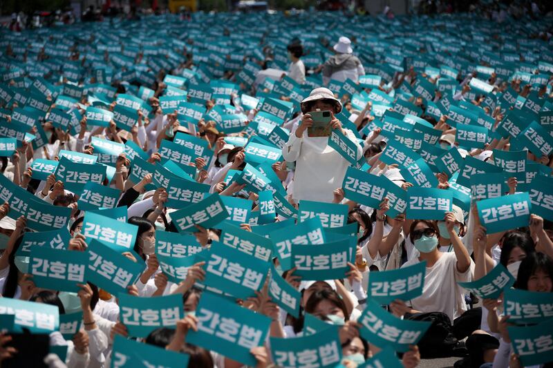 Nurses and nursing students protest against President Yoon Suk Yeol's move to redefine the occupation's remit, in Seoul, South Korea. Reuters
