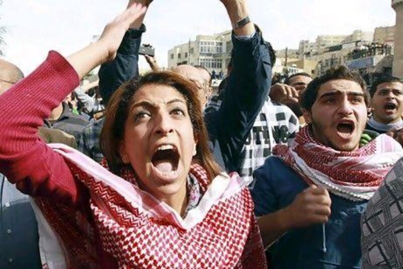 Protesters shout slogans in Amman after the Jordanian government announced the removal of fuel subsidies. Muhammad Hamed / Reuters