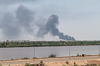 Smoke over north Khartoum during fighting in war-torn Sudan on Tuesday. AFP 