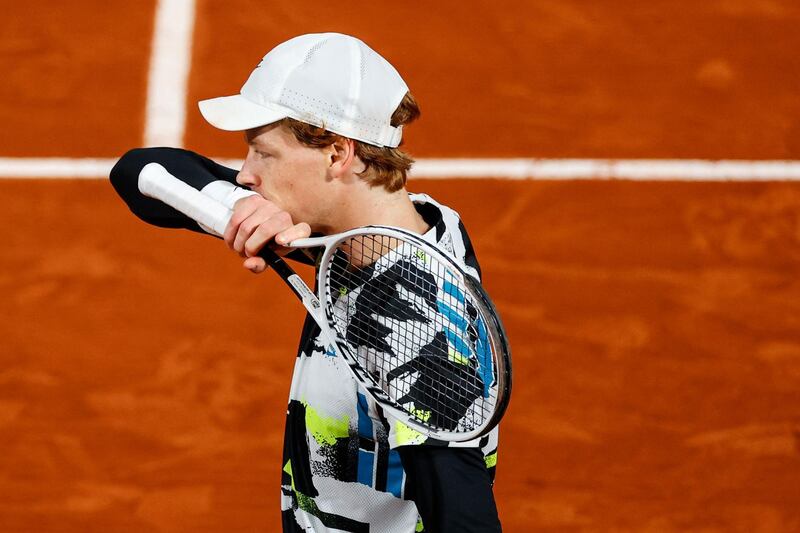 Italy's Jannik Sinner leaves the court at the end of the match. AFP