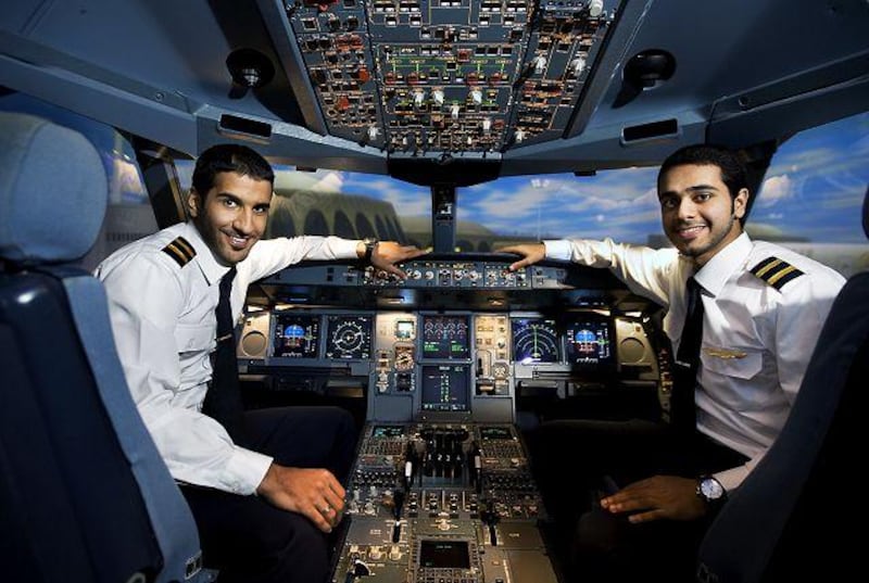 Ebrahim Haidar, left, and Mohamed al Menhali are now cadet pilots for Etihad.