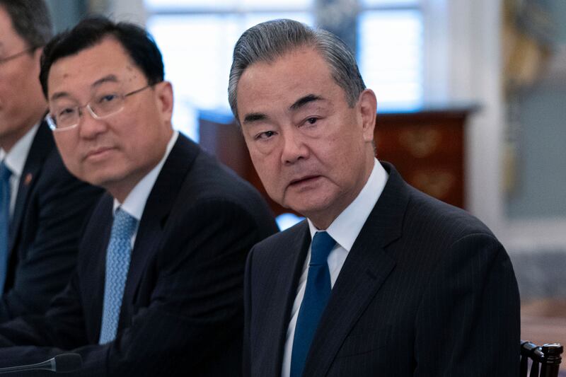Chinese Foreign Minister Wang Yi, right, attends a bilateral meeting in Washington. AP
