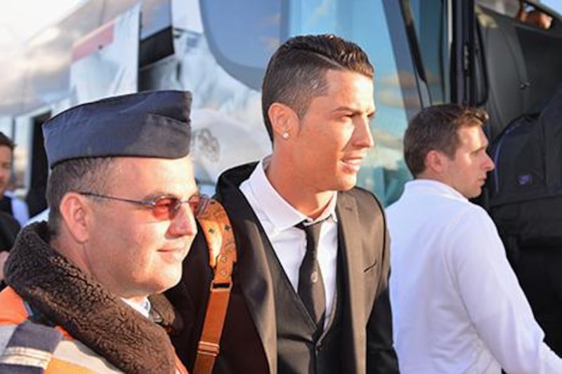 Cristiano Ronaldo, the Real Madrid star, lands with the Spanish Primera Liga team in Lisbon on Friday. Stuart Franklin / Getty Images