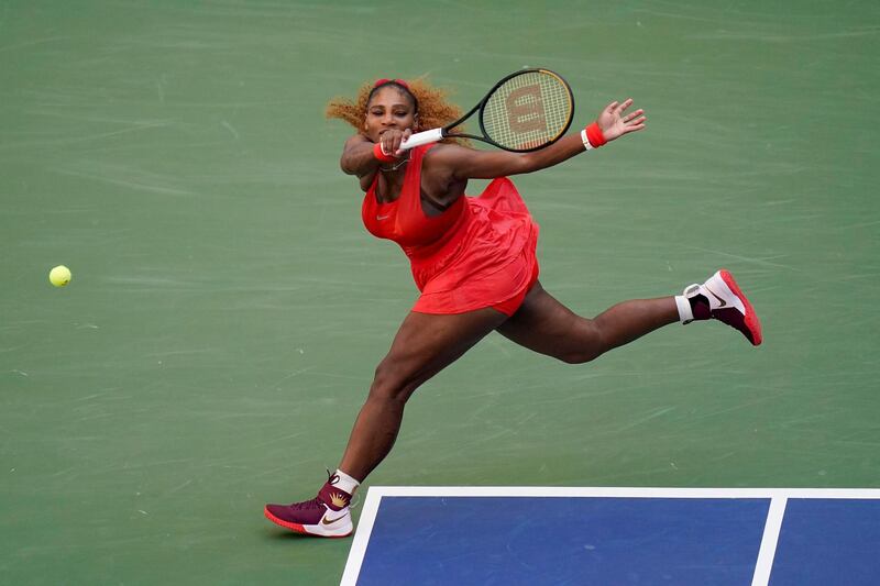 Serena Williams returns a shot to Sloane Stephens during the third round of the US Open. AP Photo