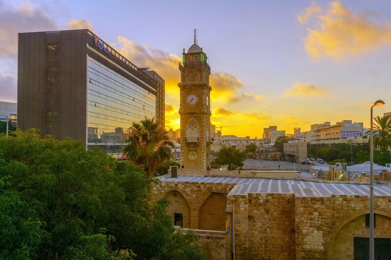 TYK7NW Haifa, Israel - June 24, 2019: Sunset view of the downtown, with the Great (Al Jarina) Mosque, in Haifa, Israel