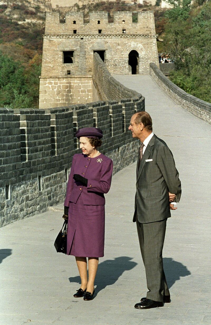 Queen Elizabeth II visits the Great Wall of China with Prince Philip on October 13, 1986. Getty Images