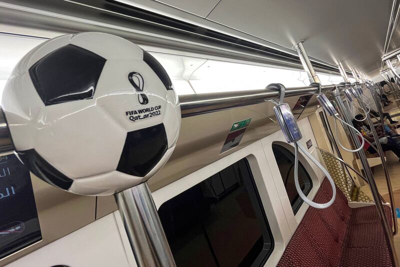 People commute in a metro train in Doha. AFP