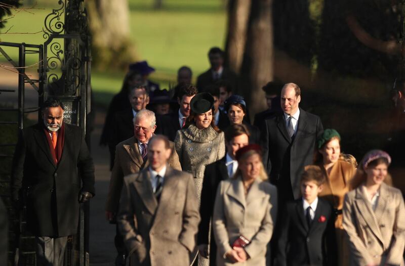 Britain's Prince William, Duke of Cambridge and Catherine, Duchess of Cambridge, center, arrive with other members of the royal family to attend a Christmas day service at the St Mary Magdalene Church in Sandringham. AP