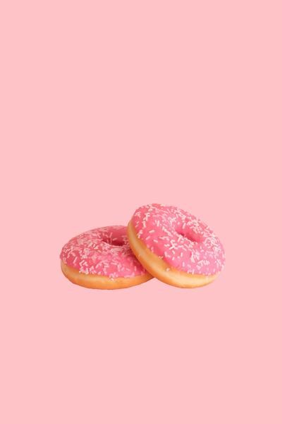 Serving up pink cakes for profit goes against the meaning of International Women's Day, argues Katy Gillett. Unsplash