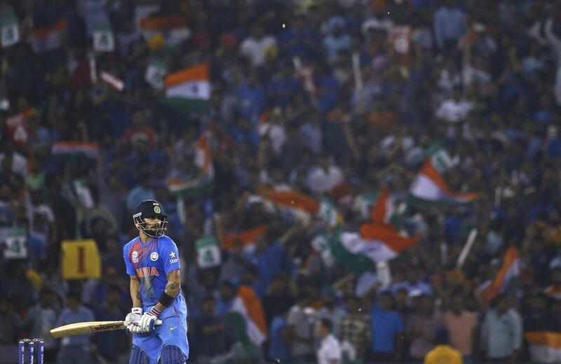 India's Virat Kohli waits to play a shot against Australia in their World Twenty20 match on Sunday in Mohali. Adnan Abidi / Reuters / March 27, 2016