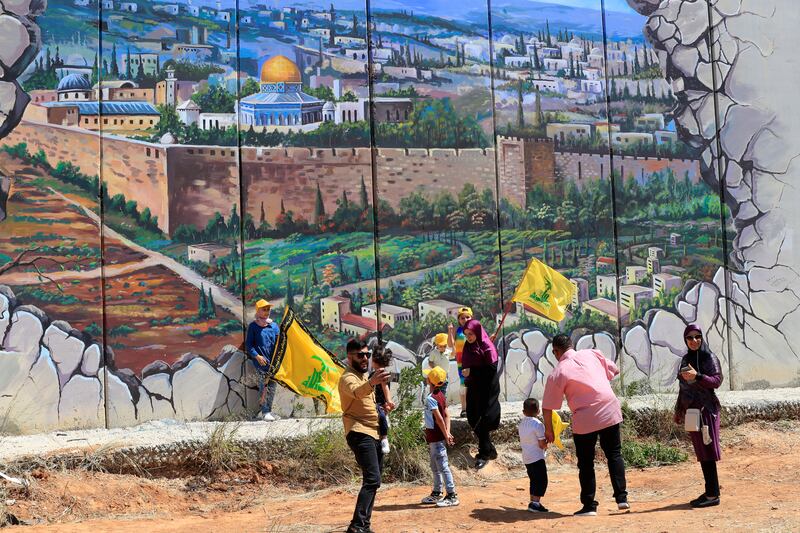 Hezbollah supporters at the Lebanese-Israeli border. AP