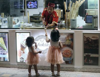 Ras Al Khaimah, May, 09, 2019: Kids enjoy the ice cream at the Al Qasimi Corniche in Ras Al Khaimah . Satish Kumar/ For the National / Story by Rubai Haza