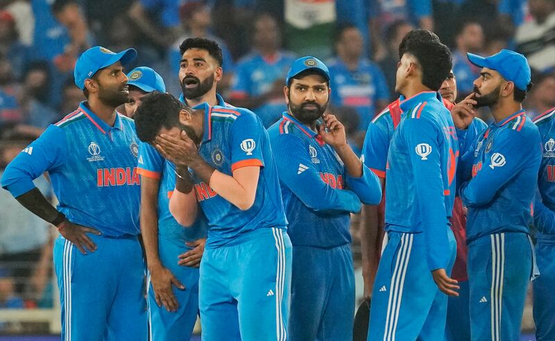 India's Jasprit Bumrah, third left, holds his head in disappointment after a not-out LBW decision against Australia's Marnus Labuschagne was upheld by the third umpire. AP 
