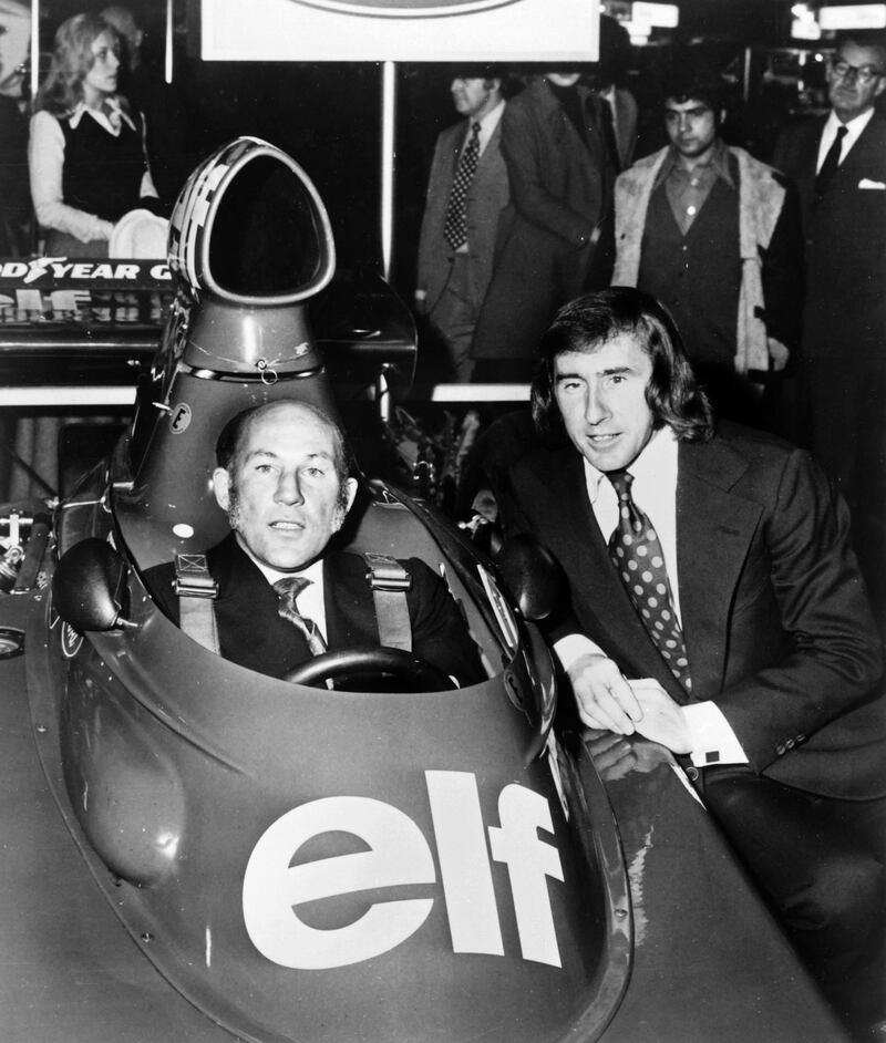 Stirling Moss. left, and Formula One world champion Jackie Stewart, right, in 1973. AFP