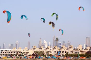 Kite surfers on Kite Beach in Dubai enjoy some well-earned time off. Chris Whiteoak / The National   