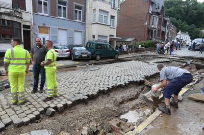 A badly damaged street after heavy rainfall in Dinant, south-west Belgium.