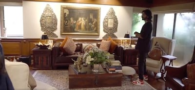 Harshvardhan Kapoor stands in the family's informal living room at the start of the home tour. Instagram / rheakapoor  