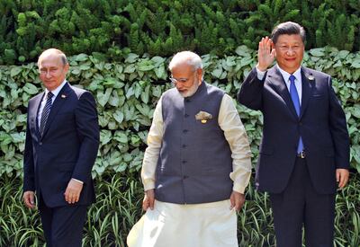 Russian President Vladimir Putin, Indian Prime Minister Narendra Modi and Chinese President Xi Jinping at the 2016 Brics Summit in Goa, India. AP