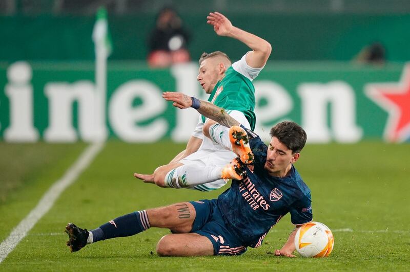 Rapid's Maximilian Ullmann is challenged by Hector Bellerin of Arsenal. Getty