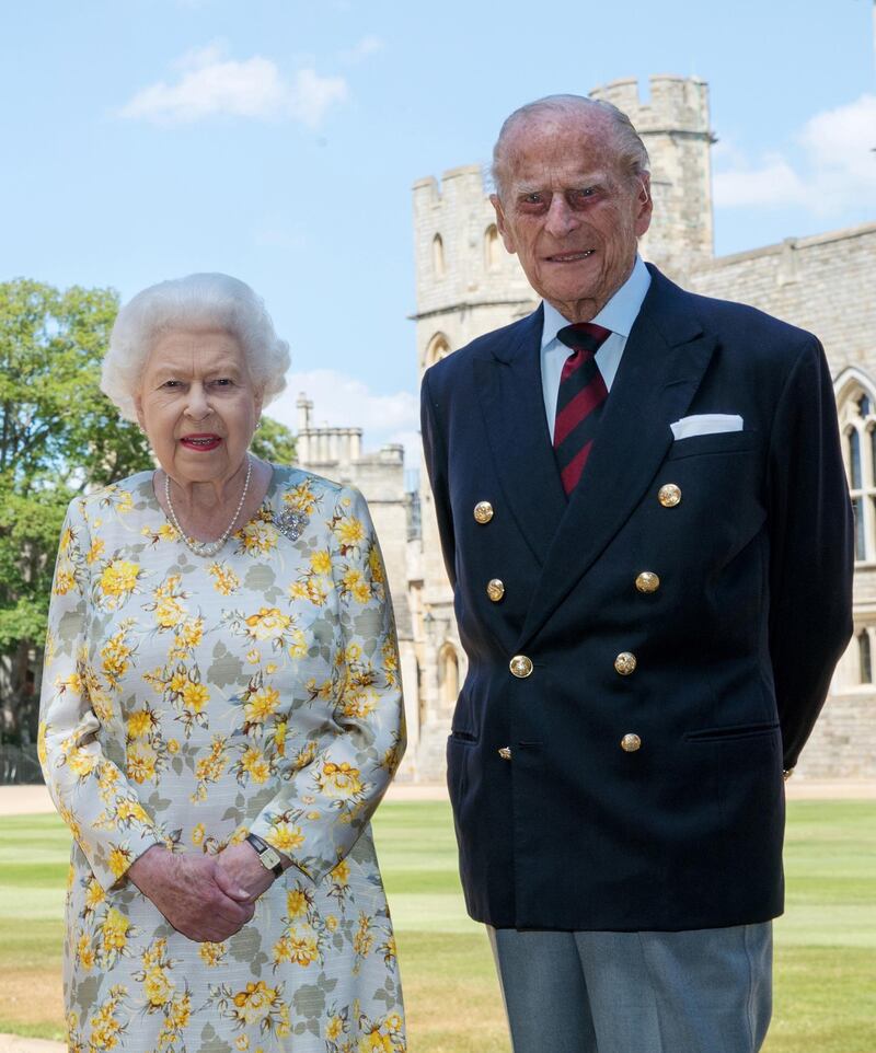 Queen Elizabeth II and the Duke of Edinburgh pose in the quadrangle of Windsor Castle ahead of his 99th birthday on Wednesday, on June 1, 2020 in Windsor, Berkshire. Press Association
