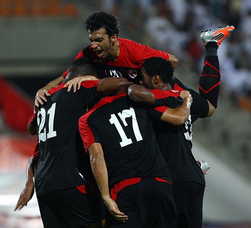 Ajman, United Arab Emirates-September  04, 2012;   Emirate team celebrates the first goal against Al Shaab  during the Pro League Round Robin tournament at the Ajman Football club in Ajman   . (  Satish Kumar / The National ) For Sports