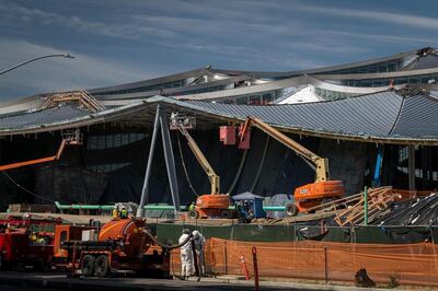 Workers wear hazmat suits during construction of a building at the Google campus in Mountain View. Bloomberg