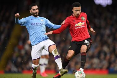 Manchester City midfielder Ilkay Gundogan, left, is determined to complete a hat-trick of League Cup triumphs. AFP