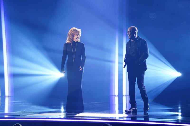 Hosts Reba McEntire and Darius Rucker on stage at the 54th annual Country Music Association Awards in Nashville, Tennessee. Reuters