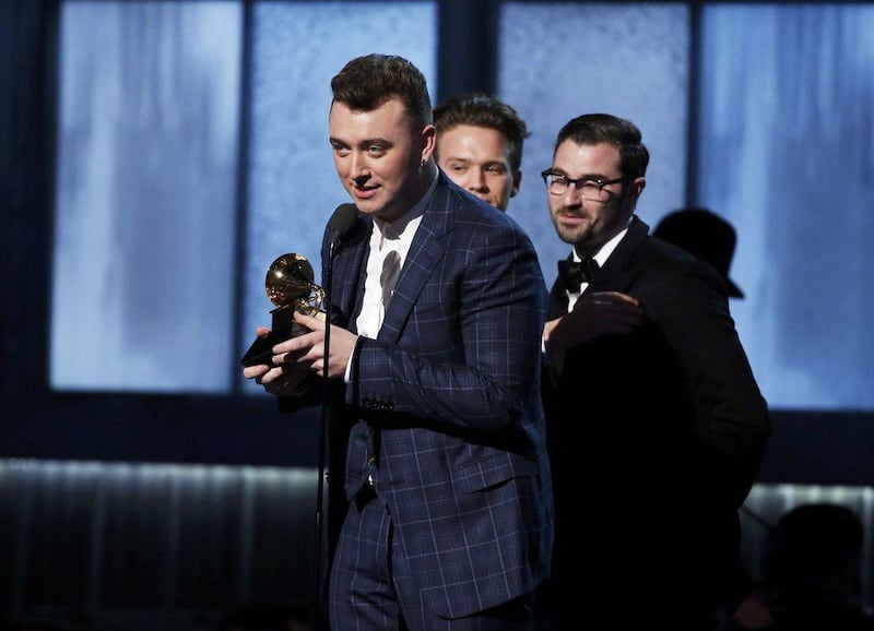 Singer Sam Smith accepts the Song of the Year award for "Stay With Me" during the 57th annual Grammy Awards in Los Angeles. Lucy Nicholson / Reuters



