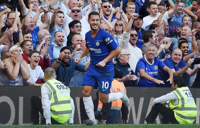 epa06990503 Chelsea's Eden Hazard celebrates scoring the 2-0 goal during the English Premier League soccer match between Chelsea and Bournemouth in London, Britain, 01 September  2018.  EPA/ANDY RAIN EDITORIAL USE ONLY. No use with unauthorized audio, video, data, fixture lists, club/league logos or 'live' services. Online in-match use limited to 120 images, no video emulation. No use in betting, games or single club/league/player publications.