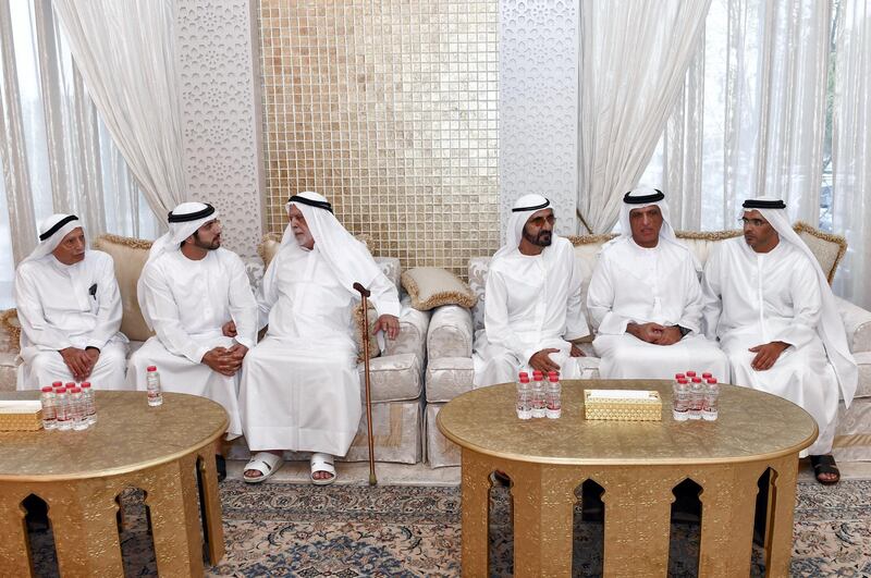 Sheikh Mohammed bin Rashid, third right, and Sheikh Hamdan, second left, visit the Al Ghurair family residence. Wam