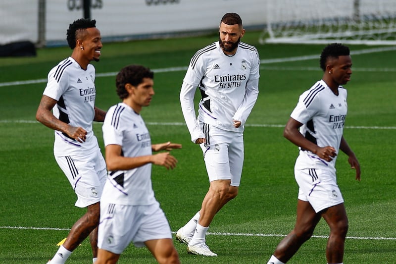 Karim Benzema and Eder Militao with Real Madrid teammates during training on Tuesday. EPA