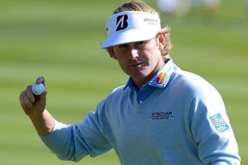 Brandt Snedeker waves to the gallery at Pebble Beach on his way to victory.