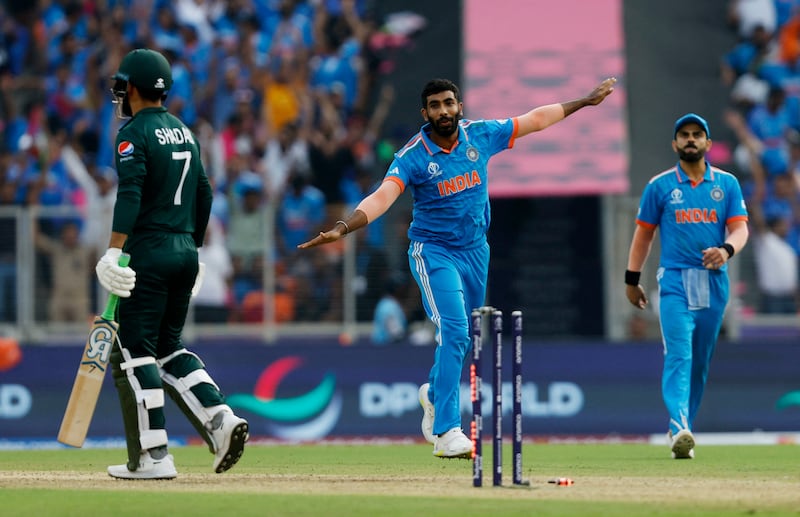India's Jasprit Bumrah celebrates after taking the wicket of Pakistan's Shadab Khan. Reuters