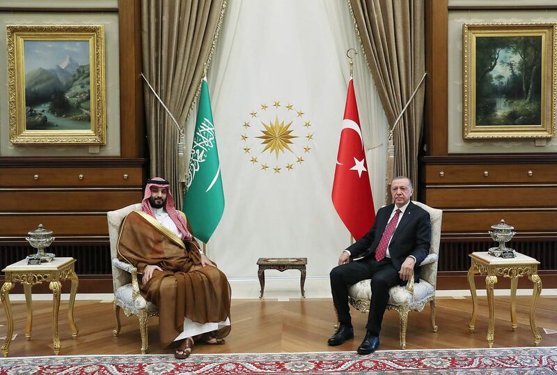 Turkey's President Recep Tayyip Erdogan posing with Crown Prince of Saudi Arabia Mohammed bin Salman during an official ceremony at the Presidential Complex in Ankara. AFP