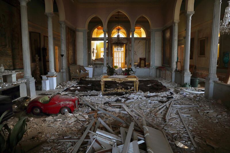 Debris from the ceiling and walls cover the floor of a room in the 150-year-old Sursock Palace that was damaged by the August 4 explosion that hit the seaport of Beirut, Lebanon. AP Photo