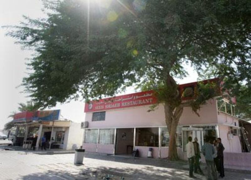 The Seeh Shoaeb restaurant in Saih Sheib, where not much has changed in the past 20 years, except for the motorway exit sign on the E11, below.