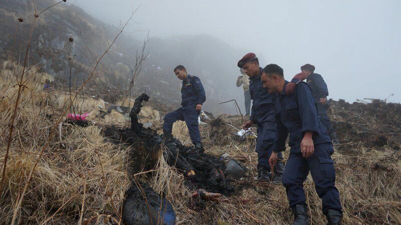 Nepalese police find a body near the wreckage of a Tara Air Twin Otter plane after it crashed due to bad weather in Myagdi, Nepal. Santosh Gautam / Reuters