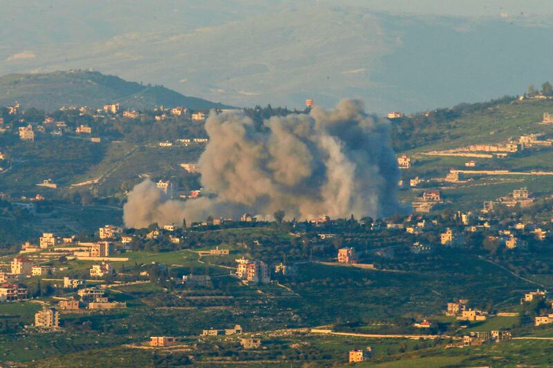 Smokes rises from the Israeli strike on Lebanon's southern village of Hula. AFP